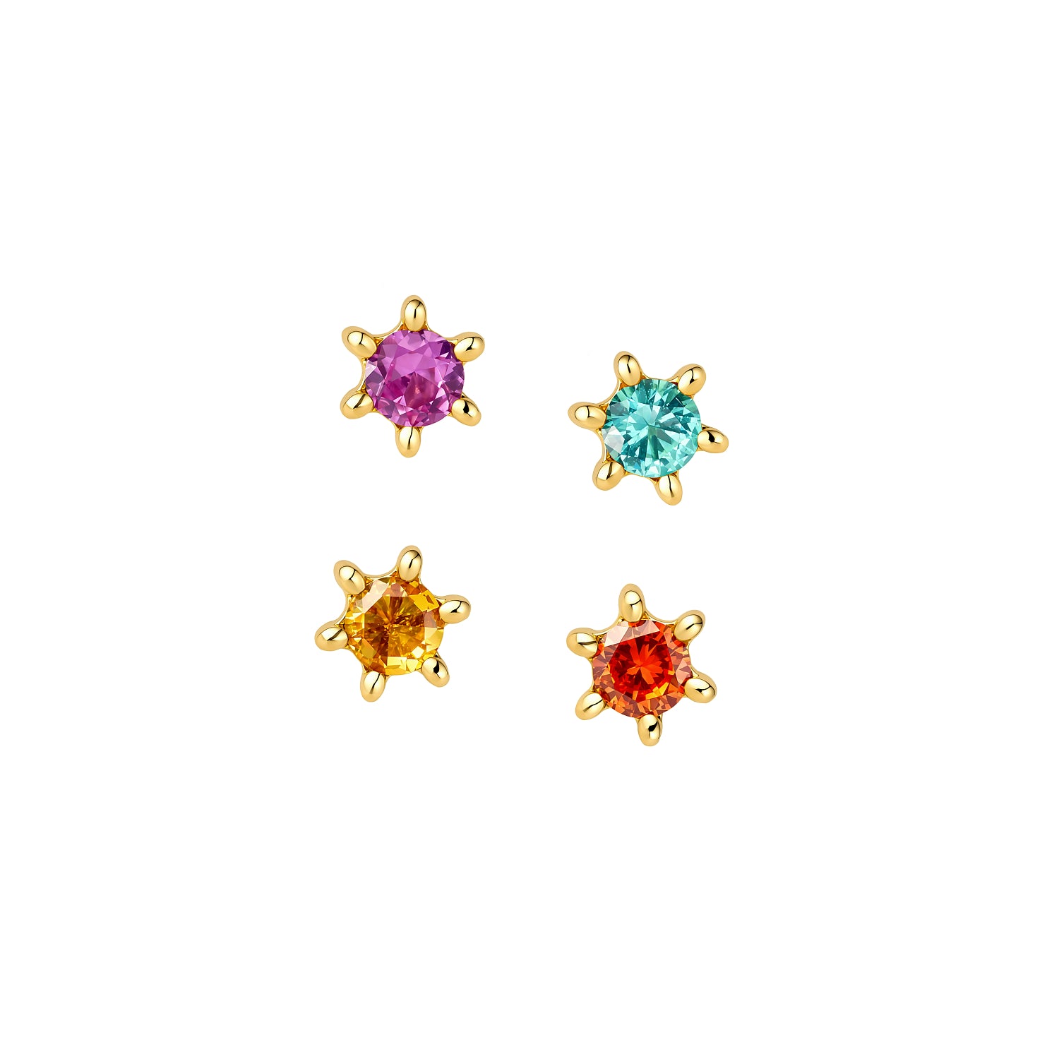 Four PVD gold titanium sun stud earrings with multicolored gemstones on a white background